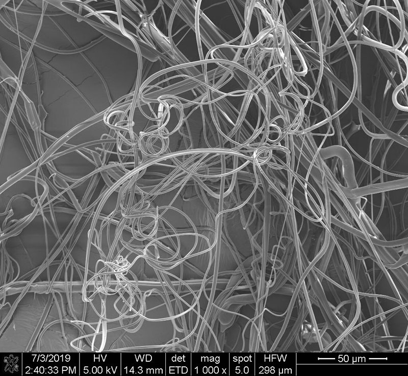 Magnified image of meltblown nonwoven fabric under microscope